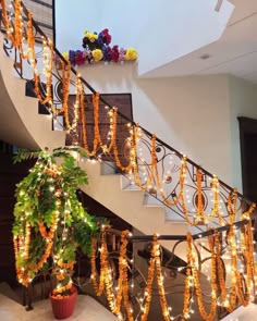 the stairs are decorated with garlands and lights