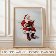 a painting of santa claus sitting on a toilet reading a book with the words printable wall art instant down