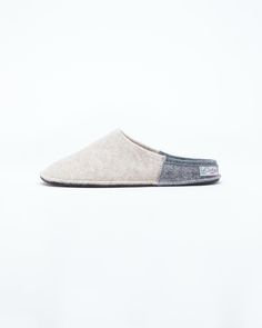 Description: The Nuvola Bico in beige and grey is our soft clog slipper, fully crafted in wool with a 1.5 cm interior heel height EVA insole for added comfort. The Nuvola retains the look of a slipper with the cushioned feel of a sneaker. Designed for the perfect amount of support and feather lightweight, Nuvola feels almost like walking on a cloud. Details: 100% Wool felt upper Two tone design: Colored front with light grey rear and insole Removable 1.5 cm interior heel height EVA insole - for Comfortable Wool Closed Toe Clogs, Classic Beige Clogs With Rubber Sole, Gray Textured Indoor Slippers, Cushioned Wool Slip-on Slippers, Wool Cushioned Slip-on Slippers, Casual Wool Slip-on Clogs, Gray Slip-on Slippers For Indoor Use, Beige Slip-on Slippers With Cushioned Footbed, Gray Slip-on Indoor Slippers