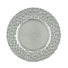 a silver plate on a white background with an oval design in the middle and small circles at the bottom