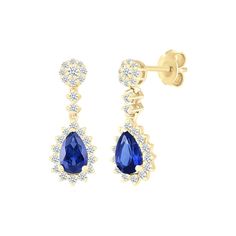 Make a bold statement with our blue sapphire dangle earrings. Crafted from solid 10k yellow gold, they feature 1.1 ct lab-created blue sapphires and a 0.49 ct lab-created white sapphire drop and halo. Blue Diamond Drop Earrings With Prong Setting, Classic Blue Diamond Drop Earrings, Sapphire Diamond Drop Earrings, Sapphire Diamond Drop Earrings In Fine Jewelry Style, Blue Diamond-accented 14k Gold Earrings, Blue Diamond Accent Earrings In 14k Gold, Sapphire Drop Earrings With Brilliant Cut, Blue Diamond Accent 14k Gold Earrings, Yellow Gold Sapphire Drop Earrings