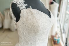 a wedding dress on display in a store