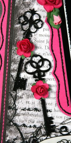 an altered photograph with roses and keys on it