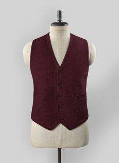 The darker shade of Dark Wine Heavy Tweed waistcoat will perfectly balance playfulness and sincerity. Crafted from wool, the tweed waistcoat is an ideal choice to make a sharp formal appearance at any event.     Look Includes    Dark Wine Heavy Tweed  Fabric  Classic Vest    Click 'Customize Now' to modify the look if needed.   Lining: Viscose; Dry Clean. Formal Red Tweed Jacket, Tweed Business Vest For Fall, Business Tweed Vest For Fall, Fall Business Tweed Vest, Winter Business Tweed Vest, Formal Tweed Vest For Winter, Formal Winter Tweed Vest, Wool Vest For Business In Fall, Wool Business Vest For Fall