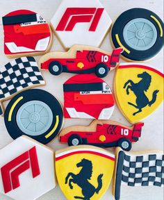 decorated cookies with cars and race flags on them