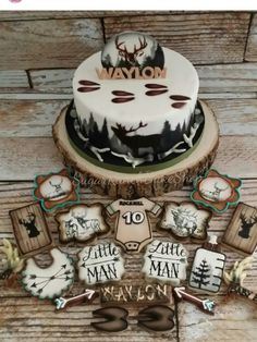 a decorated cake sitting on top of a wooden table