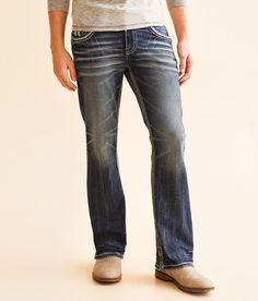 Rock Revival Ziggy Slim Boot Stretch Jean - Blue 25/30, Men's Ziggysb205 Slim fit bootcut jean Comfort stretch fabric Low rise 18 bottom opening Embroidered blowout back pockets Hand sanding whiskering grinding and veining details Zip fly. This quality denim is hand-finished for a unique look. It will wear like your favorite jeans, with each hole and tear continuing to destruct over time. You will love the comfort of this denim that has the look and feel of years of wear. . 99% Cotton 1% Elastane. Machine wash separately cold water inside out. Do not bleach. Tumble dry low. Remove promptly. Warm iron if needed. Apparel & Accessories > Clothing > Pants Bootcut Jean, Clothing Pants, Accessories Clothing, Rock Revival, Favorite Jeans, Stretch Jeans, Bootcut Jeans, The Rock, Men's Jeans