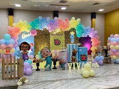 a birthday party with balloons and decorations