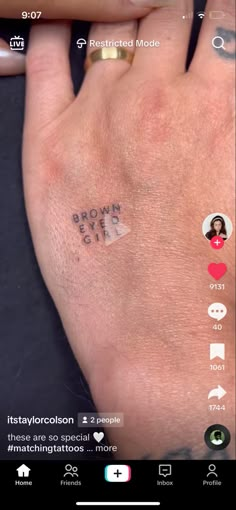 someone is holding their hand with some stickers on it and the words love you are in