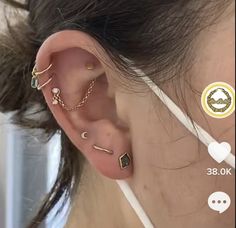 a woman with ear piercings on her ears