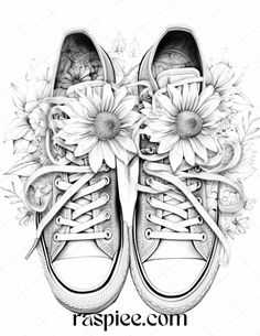 a pair of sneakers with sunflowers on the bottom and lace - up shoes