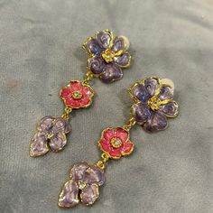 These Are Very Pretty Purple And Pink Enamel Flower Earrings. Approx 2.5” L Vintage 1980s But New 14kgp Purple Clip-on Earrings, Vintage Purple Flower Earrings, 80s Jewelry, Hummingbird Earrings, Crystal Heart Earrings, Pretty Purple, Gold Moon, Pink Enamel, Vintage Purple