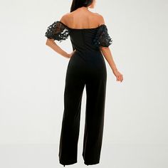 Make a statement in this elegant one-and-done women's jumpsuit from Premier Amour. It's made from a soft stretch crepe with a square neckline, mesh short sleeves accented with floral appliques, wide legs, and a back zip fastening. Features: Applique, Stretch FabricClosure Type: ZipperNeckline: Square NeckPockets: 2 Side Slip PocketsSleeve Length: Short SleeveSleeve Style: Off Shoulder SleeveFiber Content: 95% Polyester, 5% SpandexFabric Description: Crepe, MeshInseam: 32 1/2 InCare: Hand Wash, … Evening Strapless Elastane Jumpsuit, Elegant Strapless Elastane Jumpsuit For Party, Chic Elastane Jumpsuits And Rompers For Party, Stretch Elastane Jumpsuits And Rompers For Party, Fitted Elastane Pantsuit For Party, Elegant Stretch Jumpsuits And Rompers For Evening, Strapless Elastane Jumpsuit For Party, Fitted Elastane Jumpsuits And Rompers For Evening, Chic Elastane Pantsuit For Party