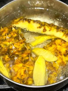 the food is being cooked in the pot on the stove top, ready to be eaten