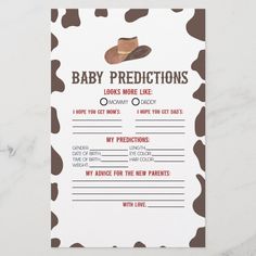 a baby dedication card with brown and white cow print