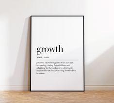 a black and white poster with the words growth on it in front of a wall