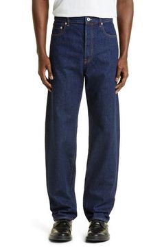 First-day-blue Japanese denim keeps you all-occasion smart in jeans that sport a slim cut and KENZO Artistic Director Nigo's real-to-wear philosophy. 32" inseam; 17" leg opening; 13 1/4" front rise; 16 1/2" back rise (size 32) Zip fly with button closure Five-pocket style 100% cotton Machine wash, line dry Imported New Concepts @Nordstrom Designer Denim Jeans With Pockets, Designer Denim Bottoms With Pockets, Designer Cotton Jeans, Designer Blue Jeans With Five Pockets, Modern Blue Jeans With Pockets, Designer Blue Cotton Jeans, Designer Straight Leg Denim Blue Jeans, Designer Denim Blue Cotton Bottoms, Modern Blue Relaxed Fit Jeans