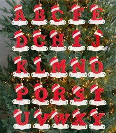 a christmas tree decorated with red and white letters