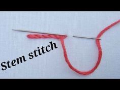 the knitting needle is being used to make a stitch