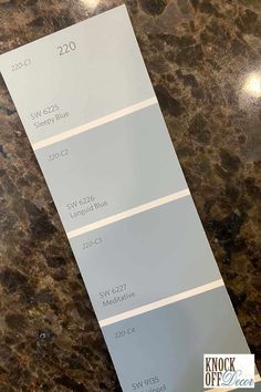 a close up of a pantone color swatch on a counter top with the words,