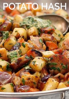 a pan filled with potatoes and meat covered in herbs