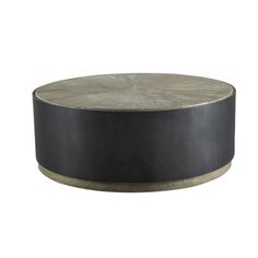 a round metal and wood coffee table on an isolated white background with clippings