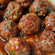 meatballs with sauce in a white bowl