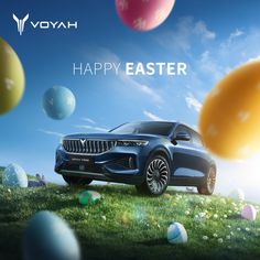 a car is parked on the grass with balloons in the sky behind it that says happy easter