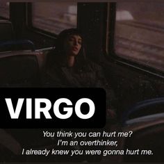 a woman sitting on a train with the words virgo in front of her face