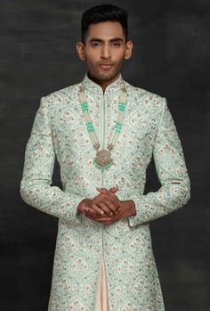 https://www.desiroyale.com/products/aqua-and-peach-mens-sherwani Pastel Green Sherwani Groom, Festive Pista Green Sherwani With Naqshi, Designer Festive Pista Green Sets, Pista Green Naqshi Sherwani For Wedding, Fitted Pista Green Kurta For Reception, Pista Green Long Sleeve Bandhgala With Intricate Embroidery, Traditional Green Nehru Jacket For Reception, Pista Green Embroidered Long Sleeve Sherwani, Pista Green Long Sleeve Embroidered Sherwani