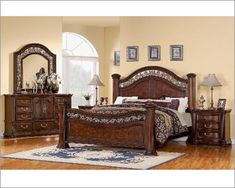 a bedroom scene with focus on the bed and dresser