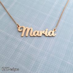 My personalized name necklace is so pretty, done in a hand writing style typeface for a sweet look. Please note, this necklace is SOLID 14k gold – NOT gold filled OR gold plated – and this includes the chain too! All of my solid gold nameplates are hand stamped 14k for authenticity. You can order any name you wish with one capital letter up to 8 letters long. Makes a great long lasting gift for a birthday or graduation.4 mm thinner nameplate gauge comes with the 1 gram box chain.8 mm upgraded na Nameplate Necklace Gold, Real Gold Necklace, Writing Style, Monogram Pendant, Silver Monogram, Hand Writing, Nameplate Necklace, Gold Name Necklace, Daughter Necklace