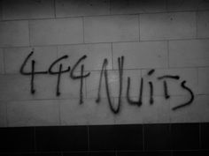 black and white photograph of graffiti on a wall that says'life is 4 minutes '