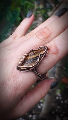 Tiger eye leaf ring, Wire wrapped copper ring, Adjustable ring for woman https://etsy.me/2vOIx43 #jewelry #ring #black #oval #yellow #copper #women #stone #bohohippie Tree Of Life Ring, Wrapped Rings, Ring Wire, Emotional Body, Copper Ring, Snake Ring, Leaf Ring, Ring Pictures, Wire Wrapped Rings