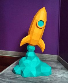 an image of a paper craft rocket ship