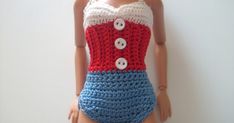 a crocheted doll wearing a red, white and blue one piece swimsuit