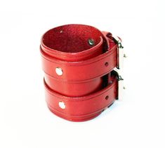 Unique red leather bracelet! Very comfortable & easy to wear. Size: Wirst size: 6-8.5 inches(16-22cm) Width: 2.55 inch (6.5 cm) Color: red. Material: genuine leather(leather is produced in Italy). If you have any questions please write! Leather Strap Cuff Bracelet Gift, Red Adjustable Leather Bracelet, Classic Leather Bracelet With Wrist Strap, Classic Leather Bracelet With Wrist Strap As Gift, Adjustable Red Leather Strap Bracelet, Adjustable Red Bracelet With Leather Strap, Handmade Red Leather Bracelet, Leather Strap Cuff Wristband Gift, Leather Cuff Wristband Gift