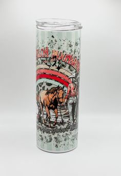 a tumbler cup with an image of a horse on it