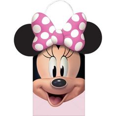 a minnie mouse head with a pink bow on it's head and white polka dots