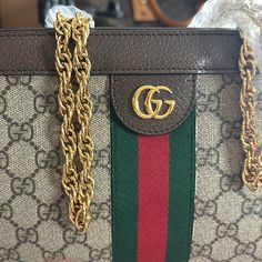 Reposhing This Item I Purchased From @Jaflasvegas. This Gucci Ophidia Crossbody Is Very Good Condition. There Is A Little Fray On The Black Tag And Little Signs On Wear On The Inside. Questions? Leave A Comment Below! Gucci Shoulder Bag With Leather Trim, Designer Gucci Shoulder Bag With Gold-tone Hardware, Free People Bags, Pre-owned Luxury Gucci Shoulder Bag, Vintage Gucci Shoulder Bag With Gold-tone Hardware, Gucci Shoulder Bag With Gold-tone Hardware For Shopping, Gucci Crossbody Bag, Gucci Mini, Gucci Crossbody