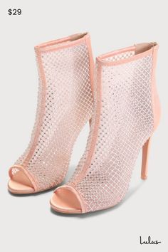 Being the center of attention comes easy when you're wearing the Lulus Hakka Rose Gold Satin Rhinestone Peep-Toe Booties! Sleek satin shapes a single sole silhouette and an almond-shaped footed, and a sturdy heel cup (with a 4.5"" back zipper). Sheer structured mesh, embellished with sparkling rhinestone details, shapes a peep-toe upper and an ankle-high shaft. A sexy stiletto heel completes these fabulous shoes! 4. 25" wrapped stiletto heel. Cushioned insole. Felted rubber sole with nonskid mar Blush Pink Wedding Shoes, Pretty In Pink Wedding, Blush Wedding Shoes, Rose Gold Satin, Cute Pumps, Pink Wedding Shoes, Neutral Heels, Fancy Shoes, Almond Shaped