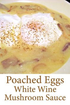 poached eggs in white wine mushroom sauce on a plate with text overlay