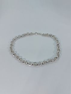 This beautiful delicate bracelet has been carefully crafted in solid 925 sterling silver. Great for any occasion! Buy it for your-self or for someone you love. Bracelet can also be resized at no extra cost and it will be shipped to you in an elegant gift box. A tracking shipping number will be provided to you once the bracelet has been mailed. Bracelet length: 8 inches Bracelet width: 8 millimeters or 0.31 inches  Weight: 17.1 grams Materials: 925 Solid Sterling Silver, also available in 10k Yel Silver Charm Bracelet With Rolo Chain For Gift, Sterling Silver Bracelets With Rolo Chain, Sterling Silver Link Bracelets With Rolo Chain, Silver Bracelet With Rolo Chain Oval Link, Silver Bracelet With Oval Link Rolo Chain, Gift Silver Chain Bracelet, Classic Silver Bracelets With Rolo Chain, Silver Link Bracelets With Rolo Chain, Classic Rolo Chain Bracelet Perfect As A Gift