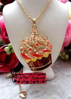 BETSEY JOHNSON DELIGHTFUL CUPCAKE WITH CRYSTAL & ENAMEL LONG PENDANT NECKLACE | eBay Sweet Gold Necklace For Gift, Sweet Gold Dangle Jewelry, Sweet Gold Necklace As Gift, Sweet Gold Necklace Perfect For Gift, Gold Enamel Party Necklace, Gold Enamel Necklace For Party, Betsey Johnson Necklace, Necklaces Pendant, Sweet Shop