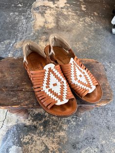 Chamula Harache Sandals. Woven with white and brown leather. Marked size 10. In excellent condition. Originally sold for $139. Electric Feathers, Ryan Roche, Christian Wijnants, Ace And Jig, Raquel Allegra, Black Crane, Magnolia Pearl, Ulla Johnson, Vivienne Westwood