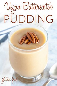 a close up of a dessert in a glass with pecans on the top and text overlay reading vegan butterscotch pudding