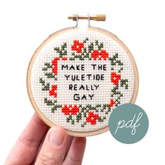 a cross stitch pattern with the words make the yuletide really gay on it