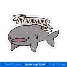 a sticker that says, my head hurts with a whale in the back ground