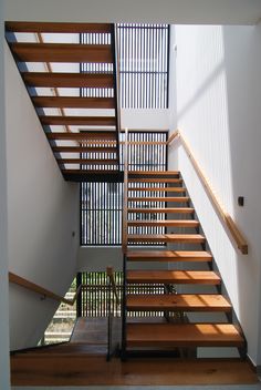 the stairs are made of wood and metal