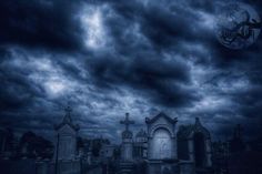 an image of a cemetery at night with the moon in the sky and clouds above it